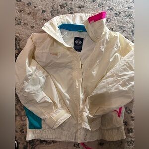 White Columbia Sportswear windbreaker with multi-coloured accents